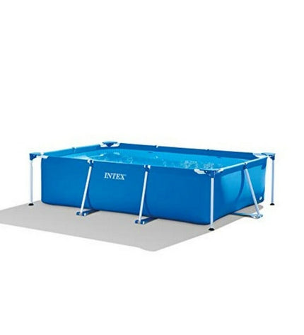 Intex 28272NP removable swimming pool in garden, showing rectangular shape, blue sides, and water capacity of 3834 liters.