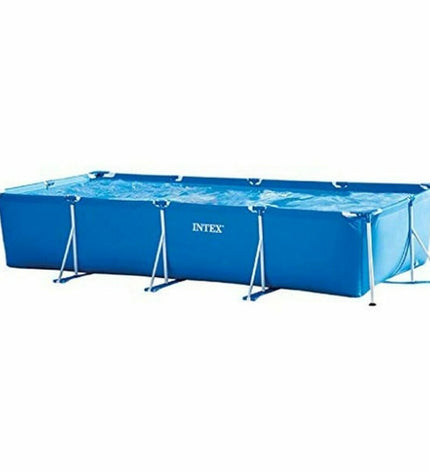 Intex 28273NP removable swimming pool in garden, showing 450x84x220 cm size with clear water and sturdy frame.
