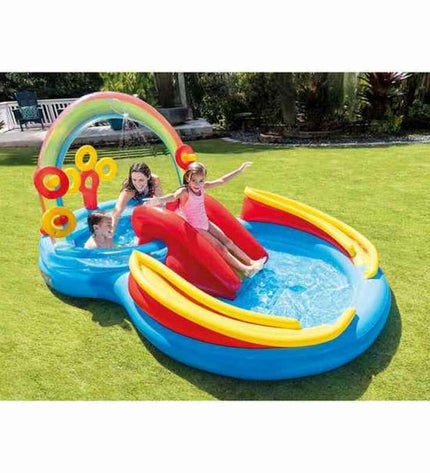 Inflatable children's rainbow pool by Intex with colorful play area, measuring 297 x 135 x 193 cm, filled with water for outdoor fun.