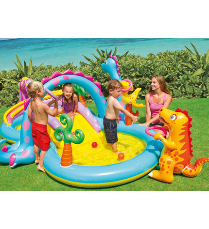 Inflatable Intex children's pool with dinosaur playground design, measuring 302x112x229 cm, filled with 280 liters of water.