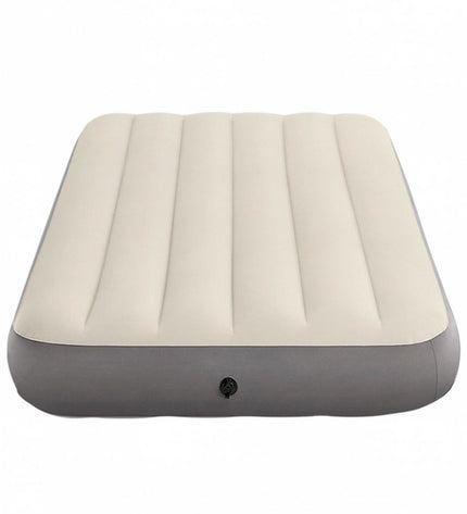 Intex Dura-Beam standard air mattress for camping, with dimensions 99x25x191 cm, shown inflated on a camping site.