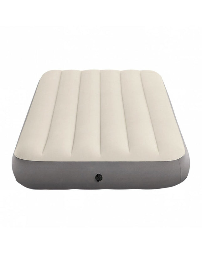Intex Dura-Beam standard air mattress for camping, with dimensions 99x25x191 cm, shown inflated on a camping site.