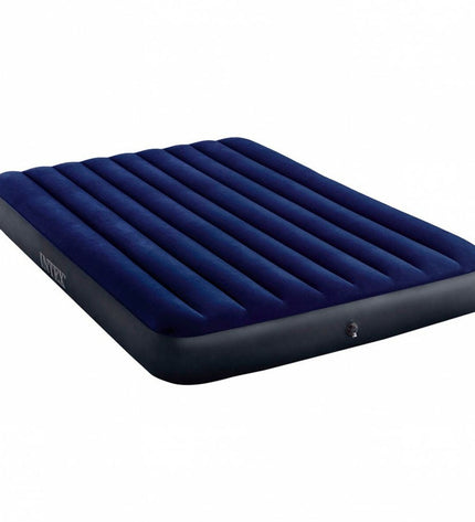 Intex STANDARD CLASSIC DOWNY air mattress for camping, 203 x 25 x 152 cm, shown inflated in a camping setting.