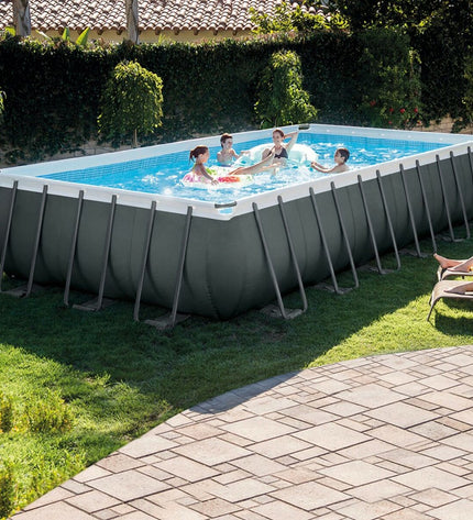 Intex removable swimming pool in backyard, 732x132x366 cm, with clear water, pool liner, and surrounding outdoor garden area