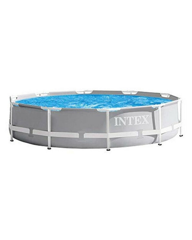 Intex 26700NP removable pool in garden, showing the 305 x 76 cm inflatable swimming pool with blue sides and water inside