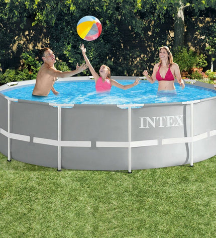 Intex Prism Frame removable swimming pool in garden, rectangular shape, blue frame and water, 366 x 99 cm size.