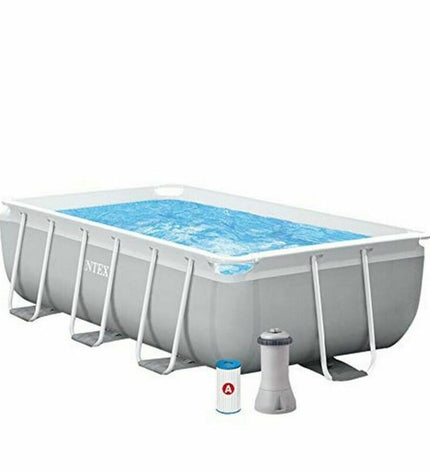 Intex 26784NP removable swimming pool in garden, 300x80x175 cm, 3539 L capacity, outdoor pool setup with water inside.