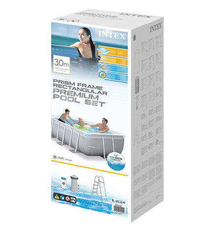 Intex removable pool with 300x80x175 cm size and 3539L capacity, set up outdoors in a garden with pool accessories.