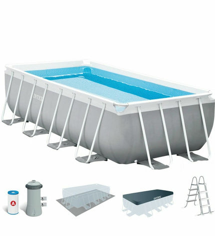 Gray Intex Prism Frame pool, 488x244x107 cm, 10,874 L, outdoor swimming pool with removable frame in garden setting.