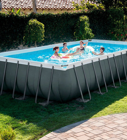 Intex removable garden swimming pool measuring 732 x 132 x 366 cm, shown partially inflated outdoors.