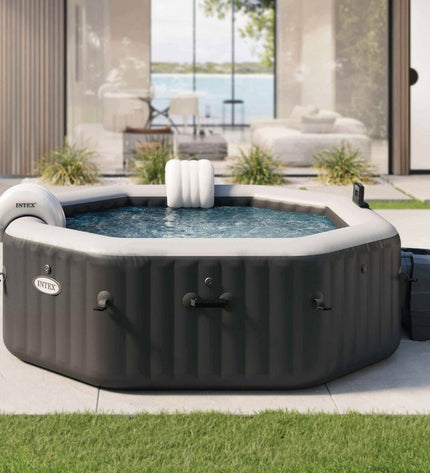 Intex inflatable pool measuring 201x71x201 cm with 795L capacity, suitable for outdoor garden use.