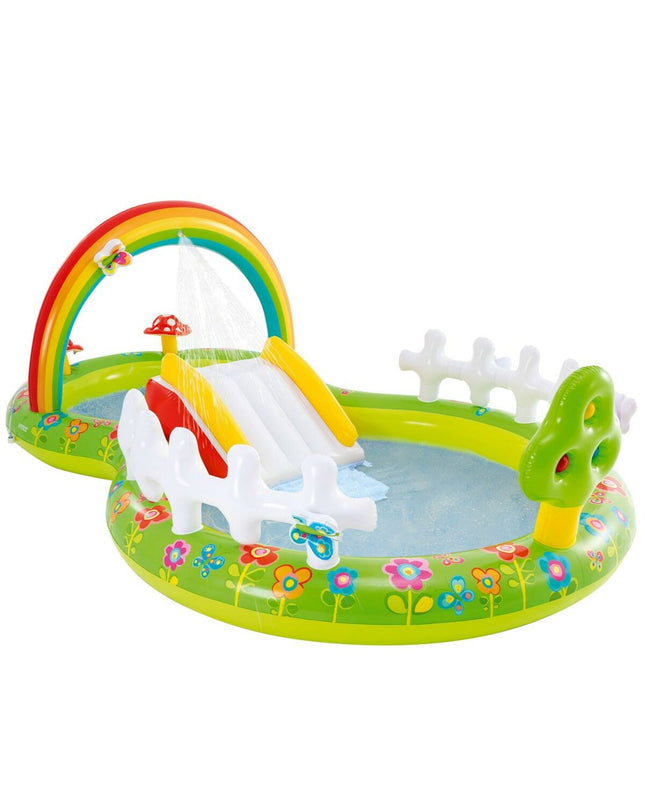 Inflatable Intex children's pool in the garden, featuring colorful design, perfect for outdoor summer play.