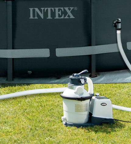 Intex SX925 pool treatment installation with hoses and controls, designed for outdoor pools and jacuzzi maintenance.