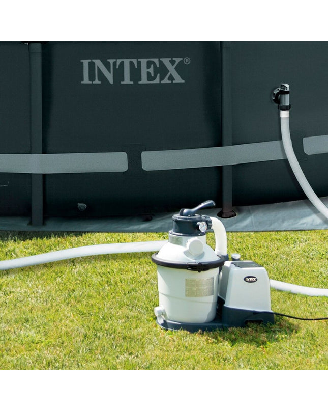 Intex SX925 pool treatment installation with hoses and controls, designed for outdoor pools and jacuzzi maintenance.