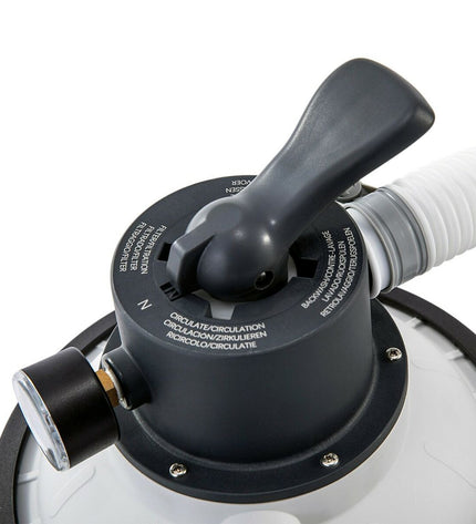 Intex SX925 pool treatment installation with hoses and controls for garden pools and jacuzzis, outdoor equipment setup.