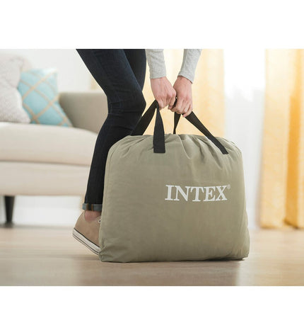 Intex Dura-Beam Basic Deluxe twin air mattress for camping, shown inflated with dimensions 99x42x191 cm, ideal for outdoor sleep.