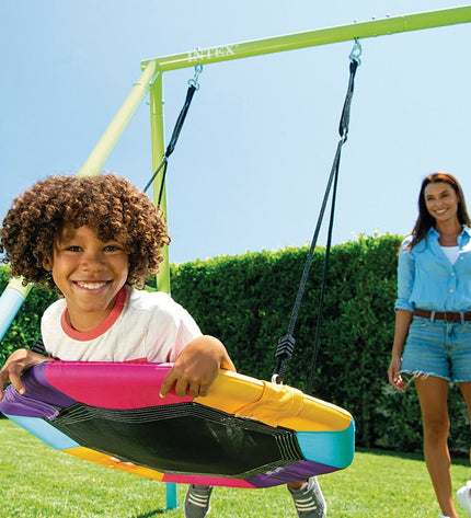 Intex swing toy in a backyard setting, with a 254x200x235 cm size, designed for outdoor play and fun activities.