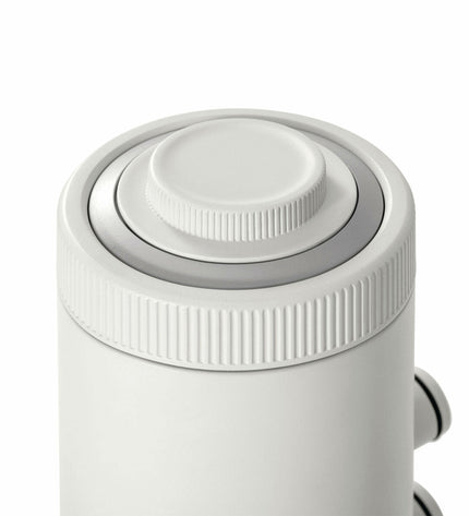 Intex zwembad behandelingsinstallatie for pool maintenance, with hoses and control unit, outdoors in a garden setting