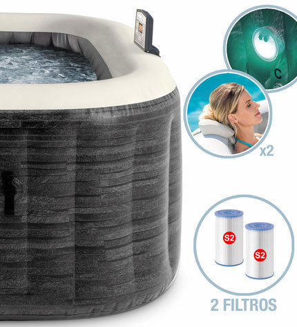 Inflatable Intex 4-person pool filled with water, suitable for garden use, featuring clear view of the pool interior and sides.