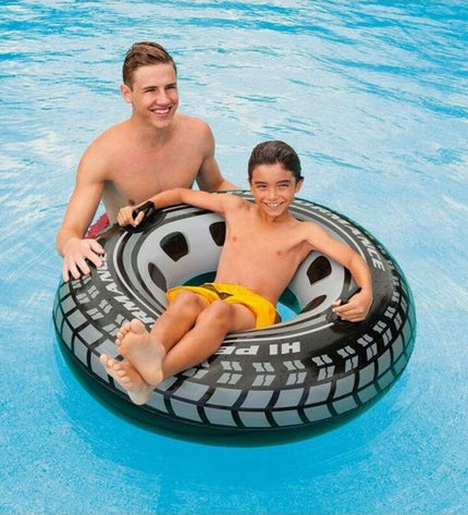 Intex Zwemband speelgoed en games, sport en openlucht, bright orange inflatable pool ring for kids in a pool setting