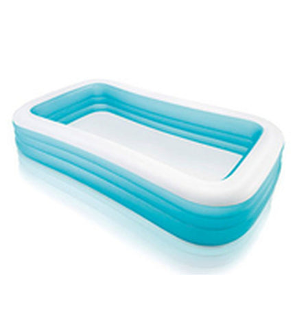 Intex inflatable swimming pool with 305x56x193 cm size, set up outdoors in a garden area, ready for summer fun.