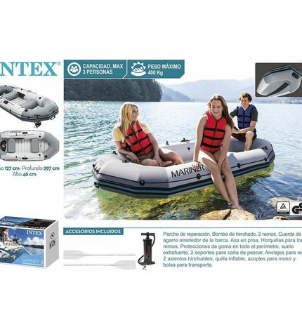 Inflatable boat by Intex, bright orange with black handles, floating on water, designed for outdoor play and water fun.