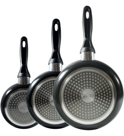 San Ignacio aluminium cookware set with pots and pans for home cooking, featuring black handles and a shiny finish.
