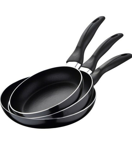 San Ignacio aluminium cookware set with multiple pots and pans for home cooking, arranged on a kitchen countertop.