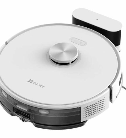 Ezviz robot stofzuiger op de vloer met ronde vorm en zwart ontwerp, ideaal voor schoonmaken en vloeronderhoud.