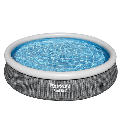 Bestway inflatable adult pool with rattan design, includes filter, measures 366x76 cm, suitable for garden use.