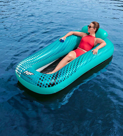 Bestway Hydro-Force inflatable lounge chair for pool and beach, measuring 198x119 cm, in vibrant blue with textured surface.