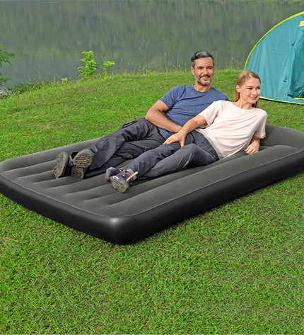 Bestway inflatable single mattress 191x137x30 cm for camping and outdoor use, shown fully inflated for outdoor sleeping.