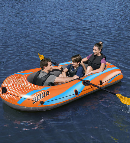 Bestway Kondor Elite 3000 boat set, colorful inflatable watercraft with paddles, designed for outdoor water sports and recreation.