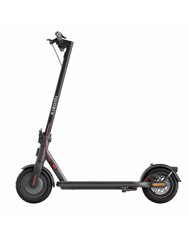 Black Xiaomi Electric Scooter 4 for urban mobility, showing the scooter's deck and handlebars in a city outdoor setting.