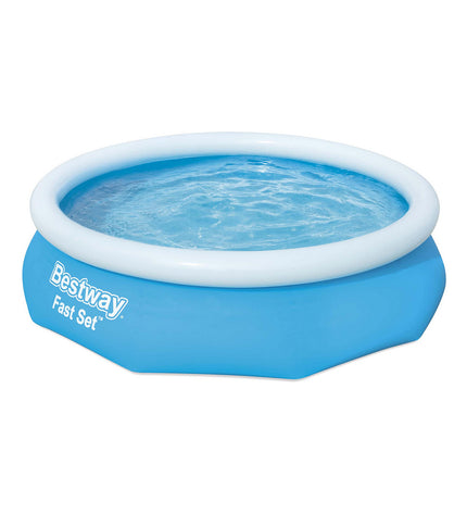 Inflatable Bestway swimming pool with 305 cm diameter and 76 cm height, set up outdoors in a garden.