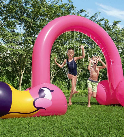Bestway Jumbo Flamingo sprinkler in pink with water spray, ideal for outdoor play, measuring 340x110x193 cm for garden fun.