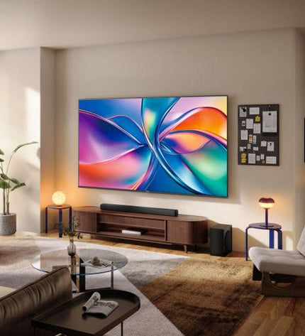 Hisense 98E7Q 98-inch 4K Ultra HD LED HDR QLED Smart TV showing a vibrant screen with colorful visuals and slim black frame.