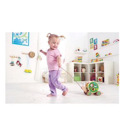 Hape Nestable Snail baby toy, colorful stacking and nesting toy for young children, measuring 30 x 18.6 x 11 cm.