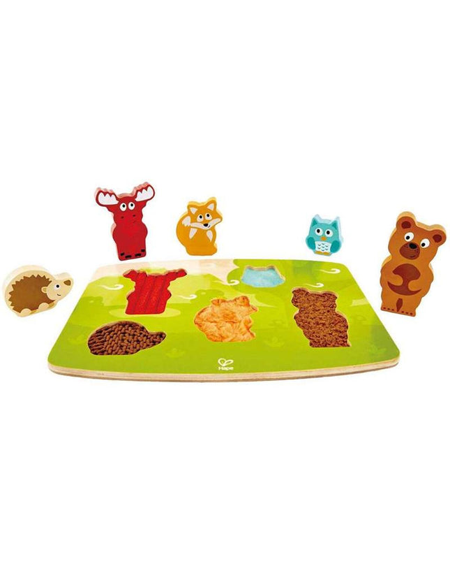 Hape wooden children's puzzle featuring colorful interlocking pieces, designed for early learning and developmental play.