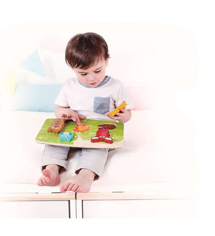 Colorful wooden children's puzzle by Hape featuring animal shapes and bright pieces, designed for early learning and play.