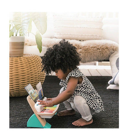 Baby Einstein Magic Touch interactive baby piano with colorful keys, tactile surface, designed for children's musical play.