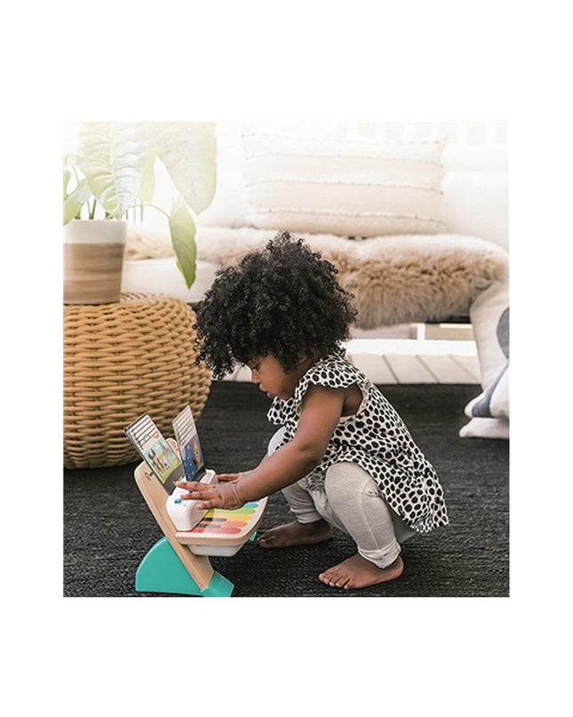 Baby Einstein Magic Touch interactive baby piano with colorful keys, tactile surface, designed for children's musical play.