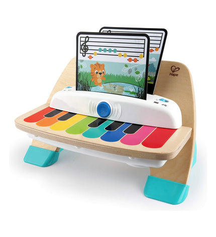 Baby Einstein Magic Touch interactive baby piano, tactile musical toy for children, 30x14x17 cm, colorful and engaging.