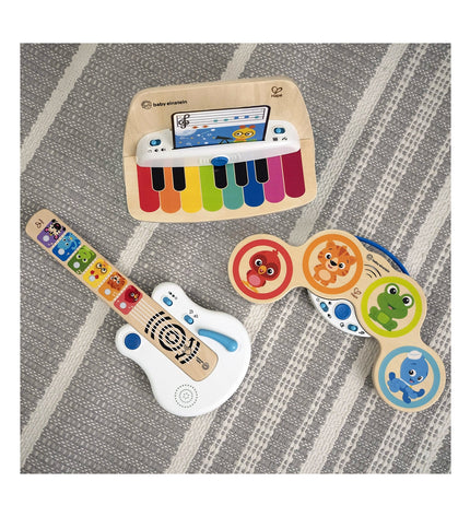 Baby Einstein Magic Touch interactive baby piano with tactile keys, colorful design, and compact size for young children.