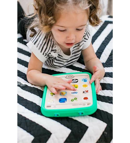 Hape educational toy game with colorful components, designed for learning and fun in a playful setting.