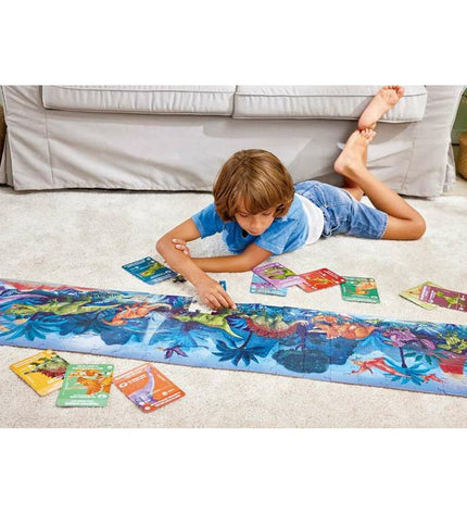 Hape dinosaur puzzle with 200 pieces, 150x30 cm, featuring colorful dinosaur images and detailed interlocking pieces.