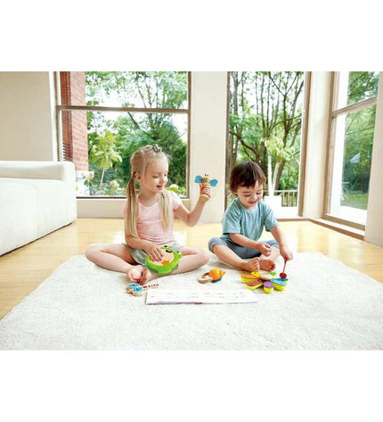 Toybags wooden toy musical instruments set for children, includes colorful small percussion instruments in a playful toybag.