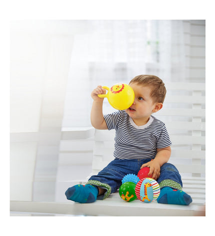 Fisher-Price baby stuffed animal toy featuring colorful animal characters, soft plush material for young children.