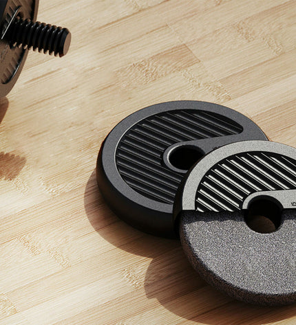 Xiaomi 10 kg kettlebell and dumbbell set for fitness, featuring a black kettlebell and adjustable dumbbells for outdoor workout use.