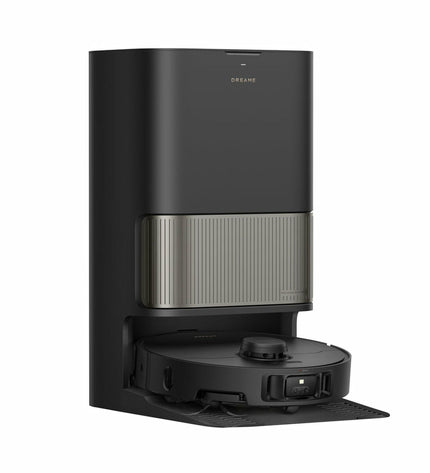 Dreame robot stofzuiger on hard floor, featuring sleek design and sensors for automated cleaning in home and kitchen.
